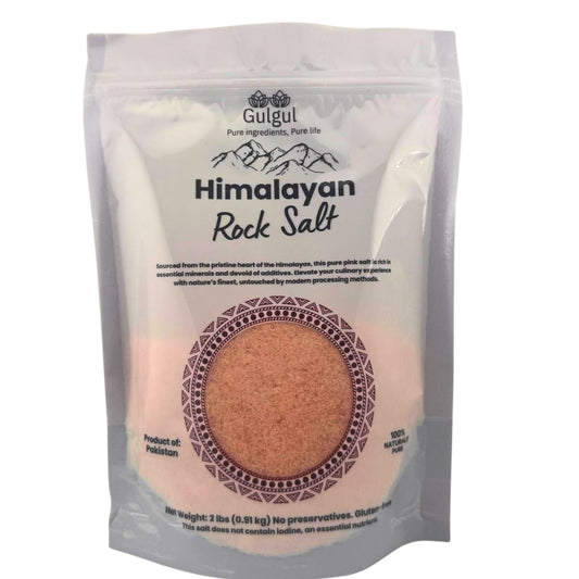 Fine pink Himalayan salt in bowl showing natural rose-colored fine grain texture