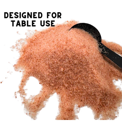 Close-up of fine grain pink Himalayan salt showing mineral-rich pink crystal texture